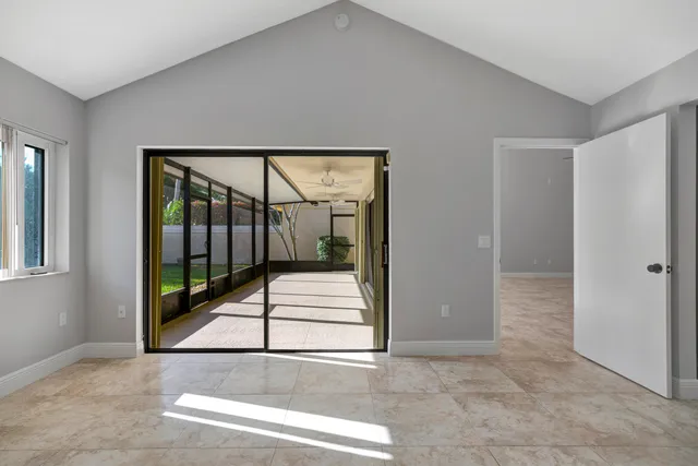 a view of an empty room and window