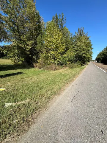 an aerial view of a houses with outdoor space