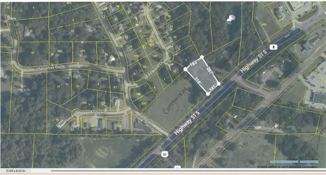 a view of an outdoor space of the building and cars park