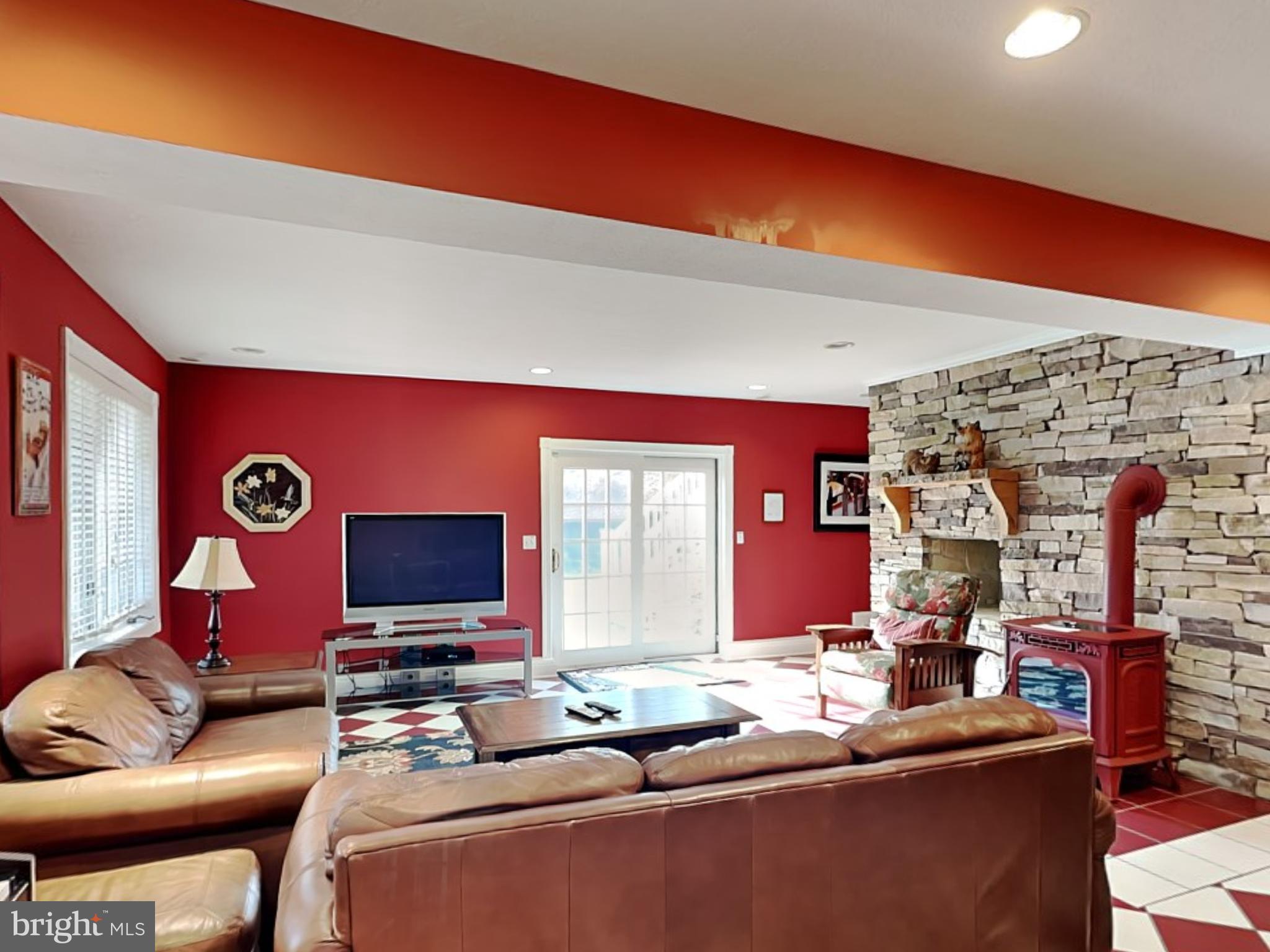3067 Shingle Camp Road McHenry, MD 21541 - Photo 11 of 68 a living room with furniture and a flat screen tv