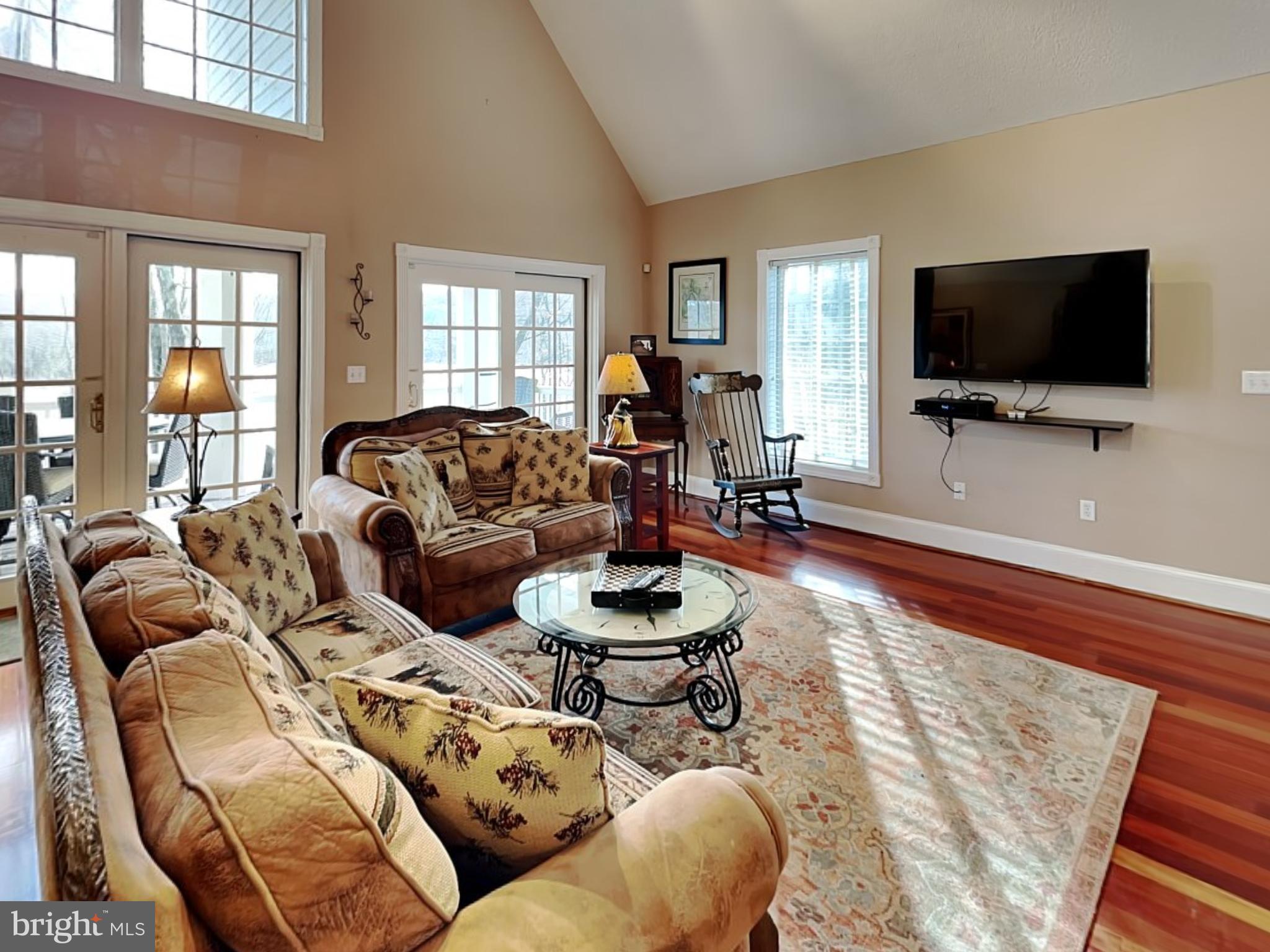 3067 Shingle Camp Road McHenry, MD 21541 - Photo 3 of 68 a living room with furniture and a flat screen tv