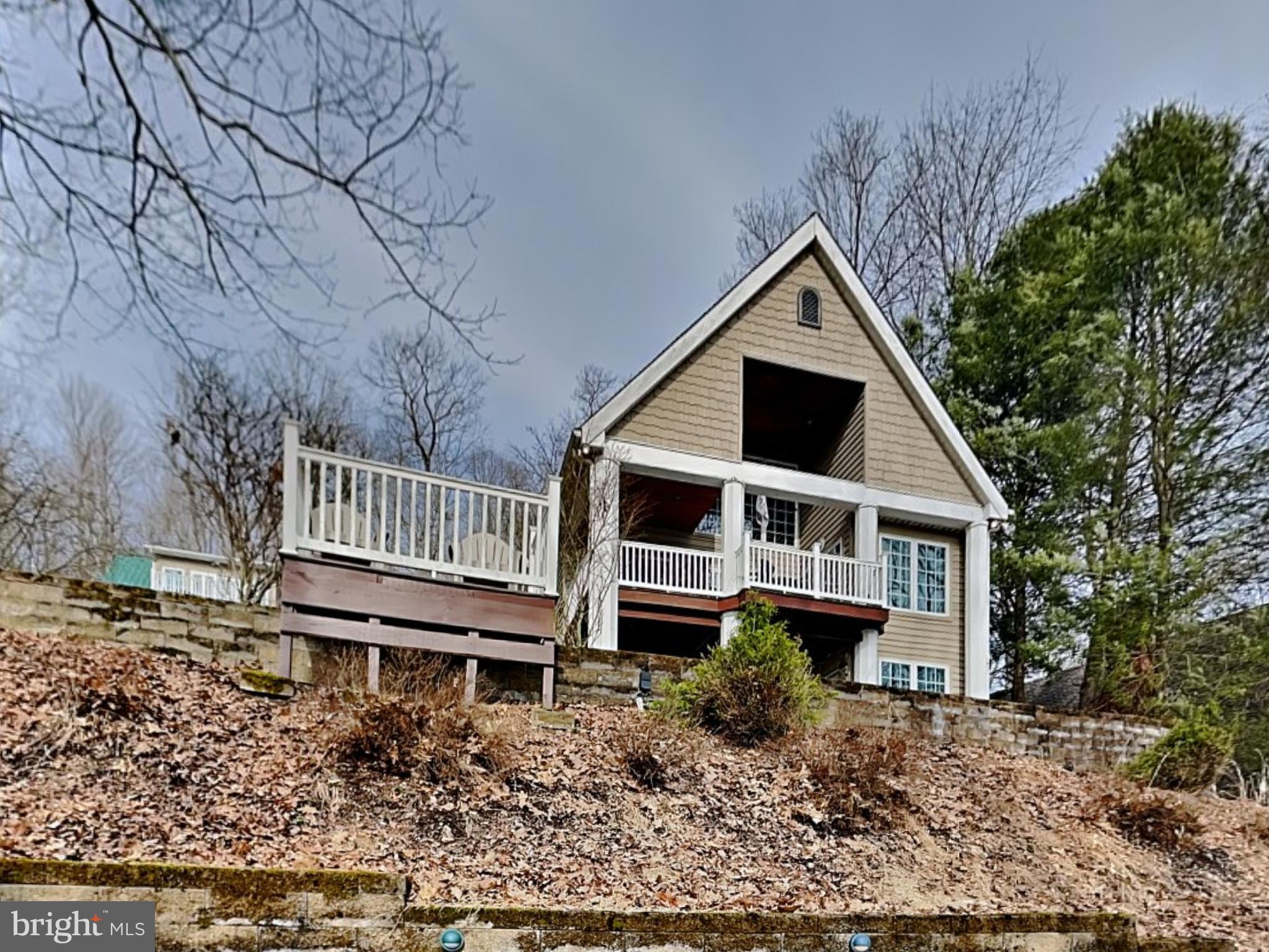3067 Shingle Camp Road McHenry, MD 21541 - Photo 42 of 68 front view of a house with a yard