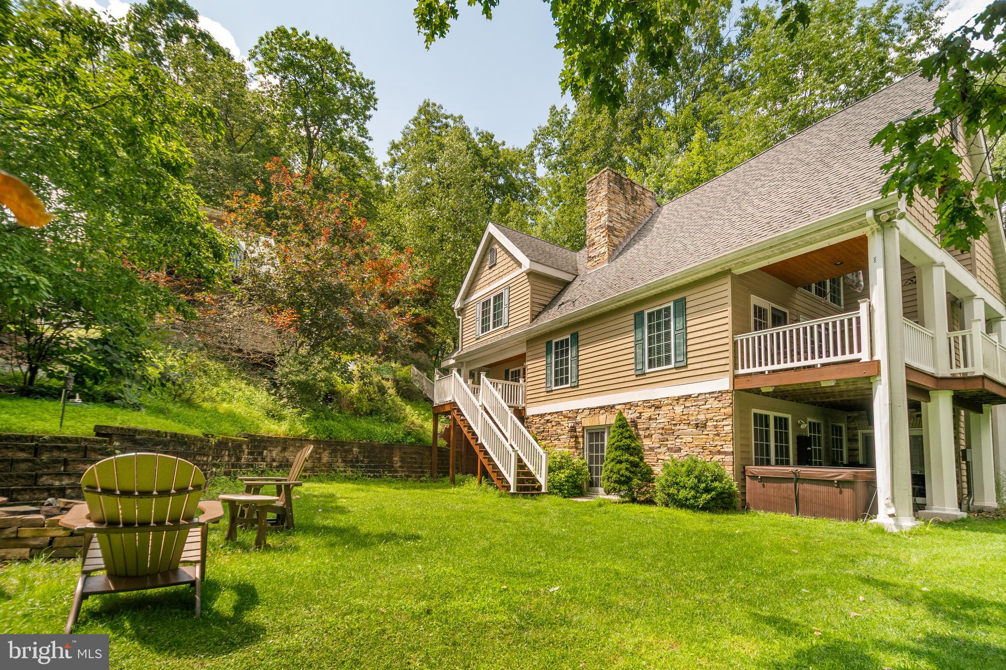 3067 Shingle Camp Road McHenry, MD 21541 - Photo 44 of 68 a front view of house with yard and green space