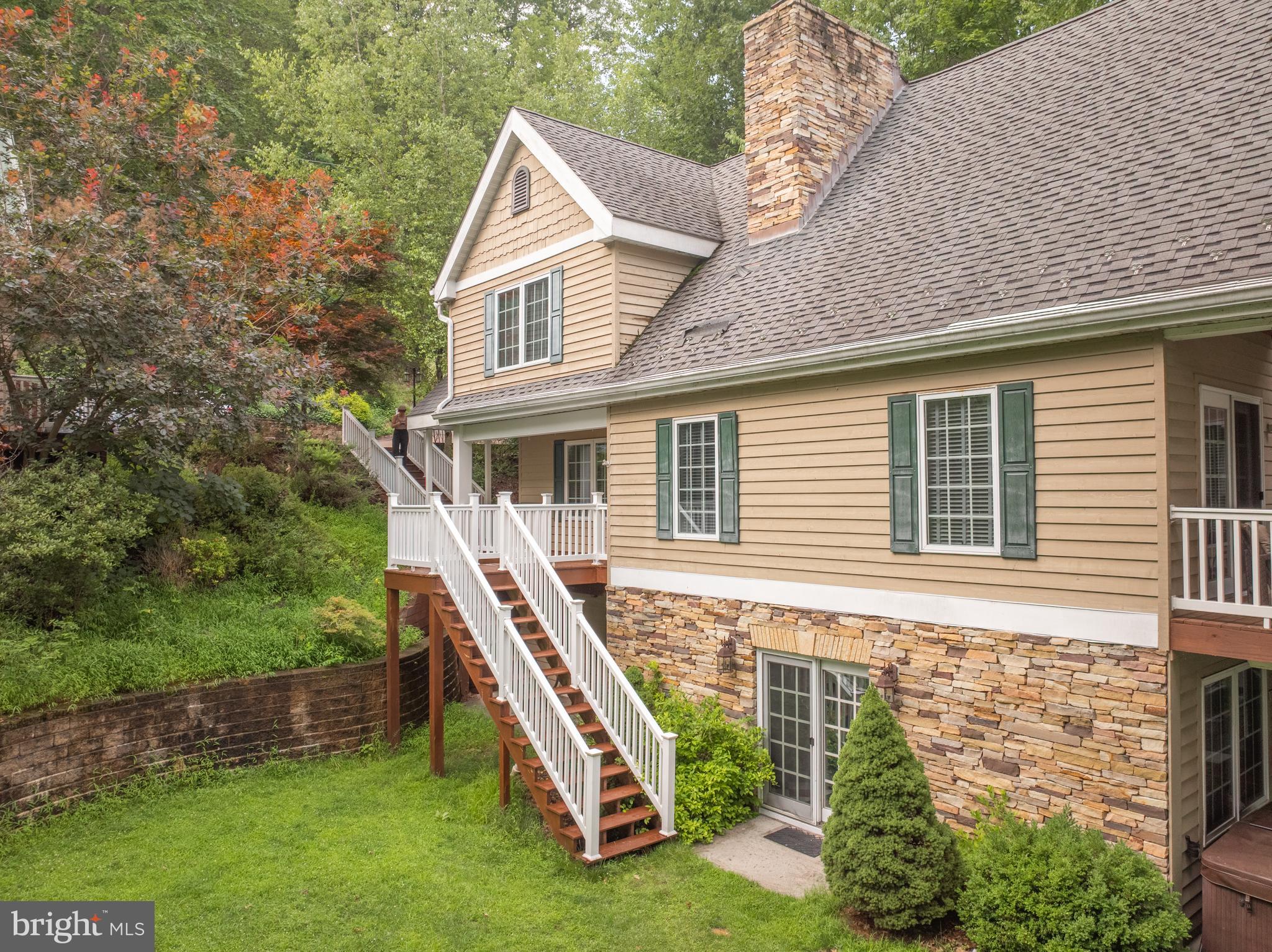 3067 Shingle Camp Road McHenry, MD 21541 - Photo 45 of 68 a view of a house with a yard and furniture