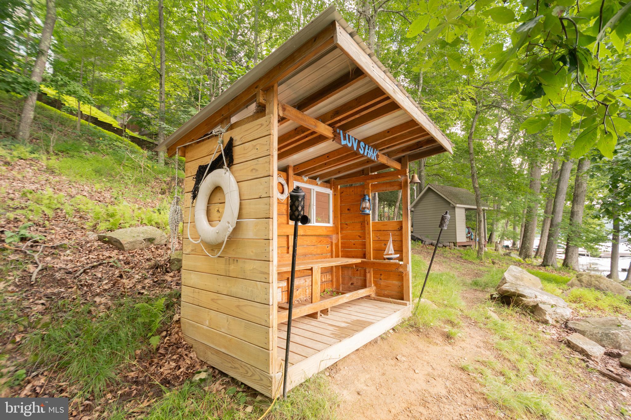 3067 Shingle Camp Road McHenry, MD 21541 - Photo 46 of 68 a view of a house with a yard