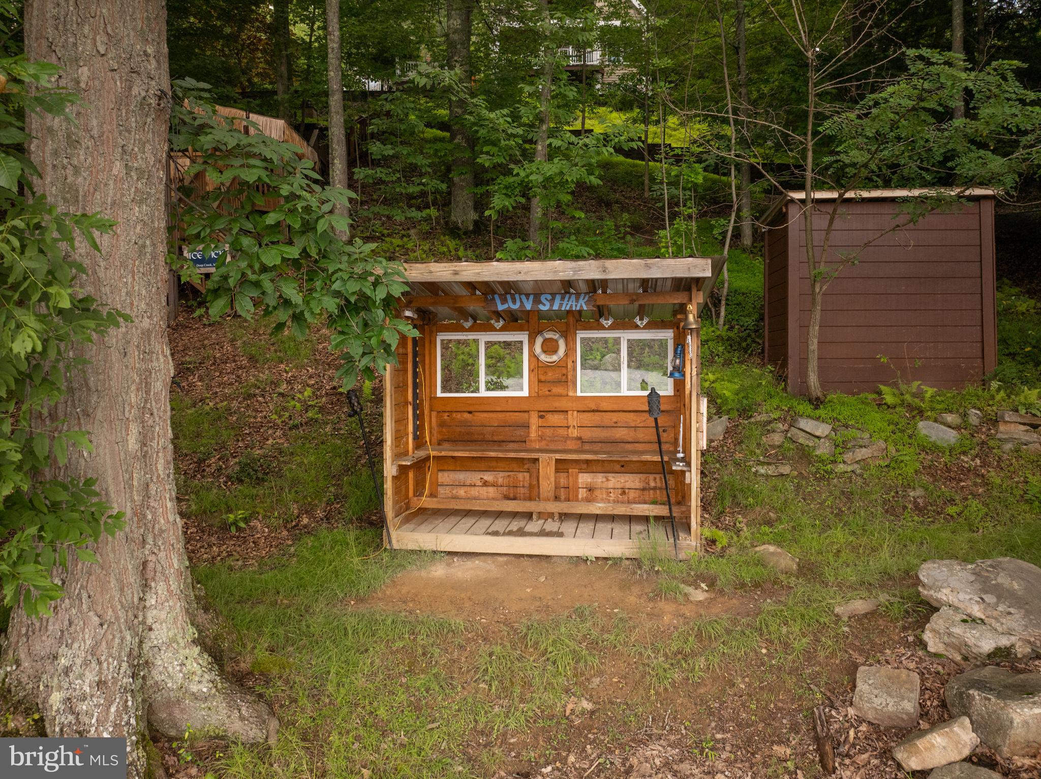 3067 Shingle Camp Road McHenry, MD 21541 - Photo 50 of 68 front view of a house with a yard