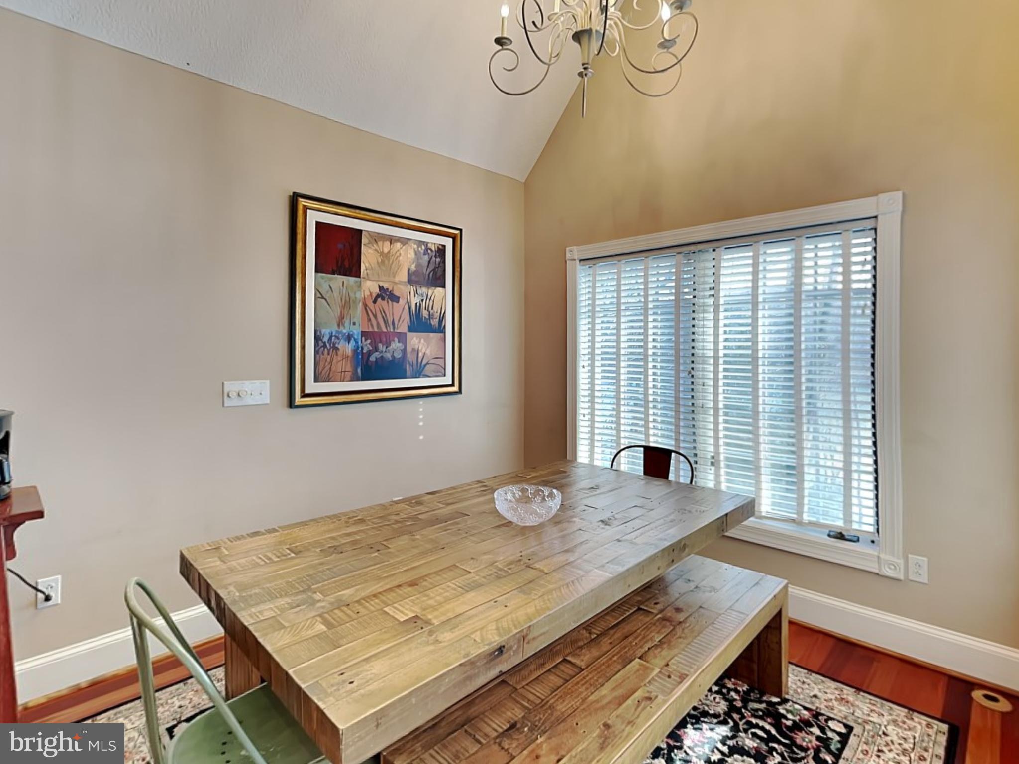 3067 Shingle Camp Road McHenry, MD 21541 - Photo 5 of 68 a view of a dining room with a table and chairs