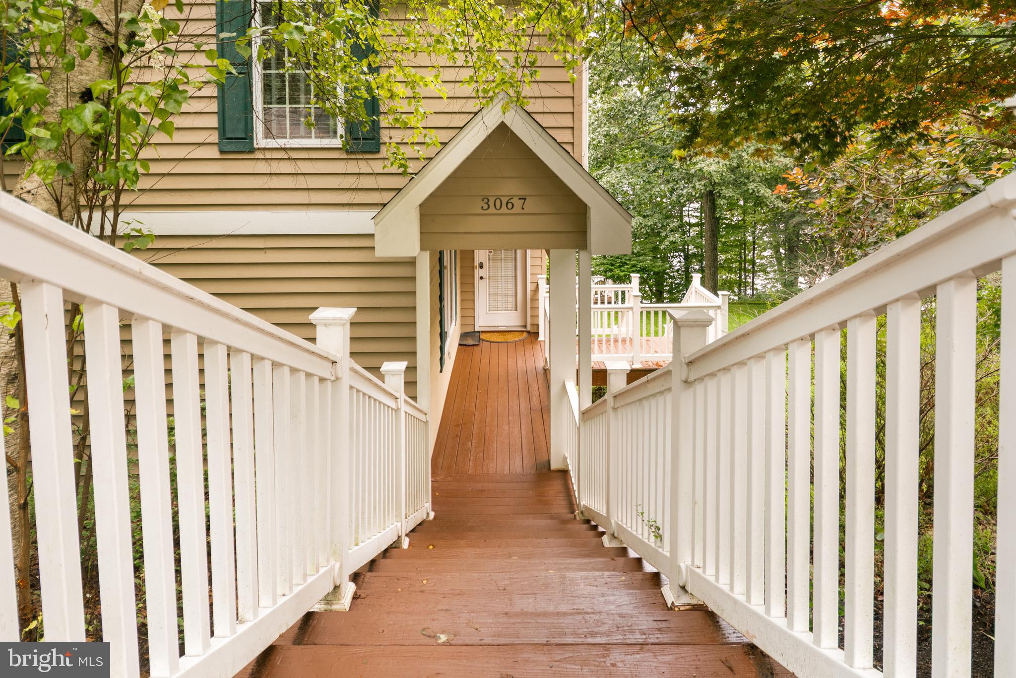 3067 Shingle Camp Road McHenry, MD 21541 - Photo 65 of 68 a view of a porch with wooden floor and stairs