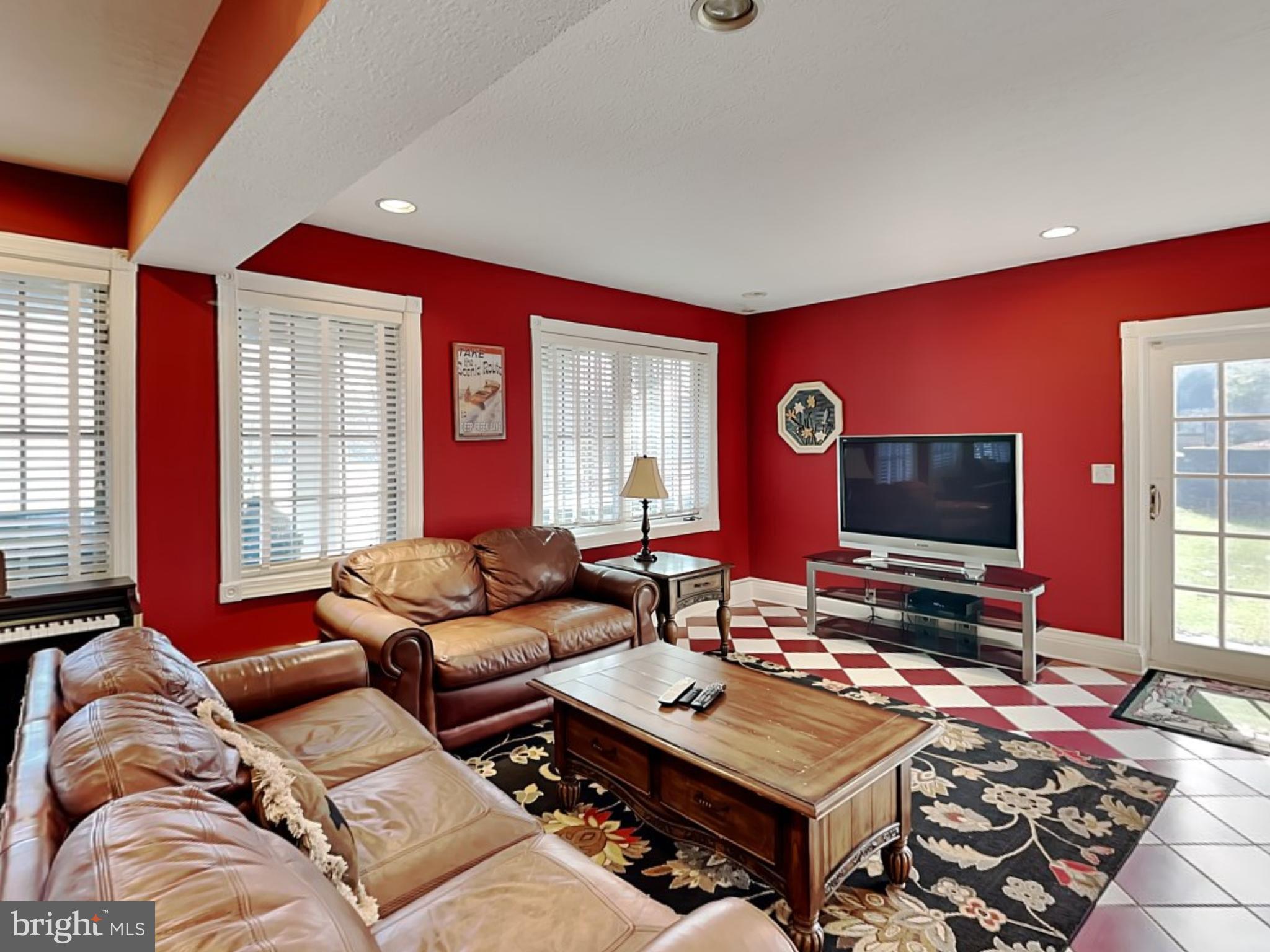 3067 Shingle Camp Road McHenry, MD 21541 - Photo 9 of 68 a living room with furniture and a flat screen tv