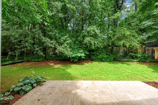 a view of a garden with a bench