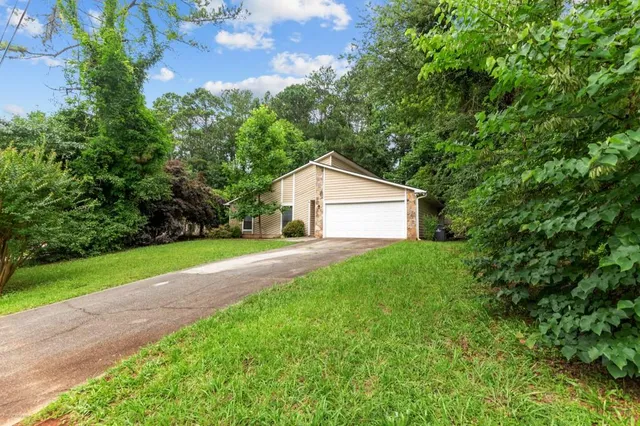a view of a backyard of house