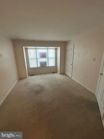 a view of empty room with window