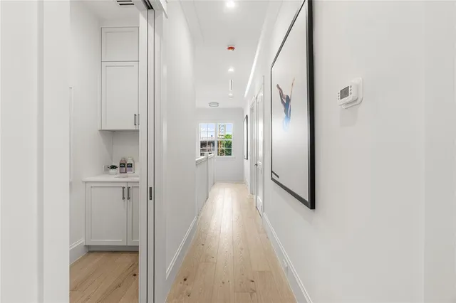 a bedroom with a large bed and a dresser