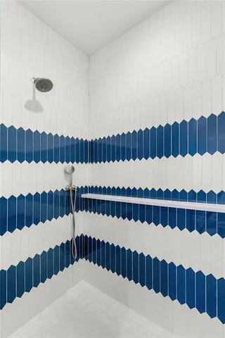 a view of a hallway with washer and dryer