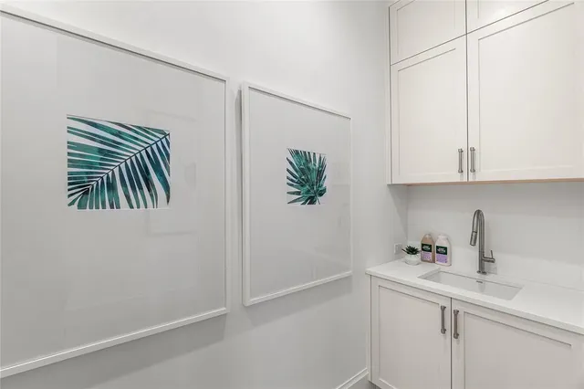 a spacious bedroom with a large bed and a window