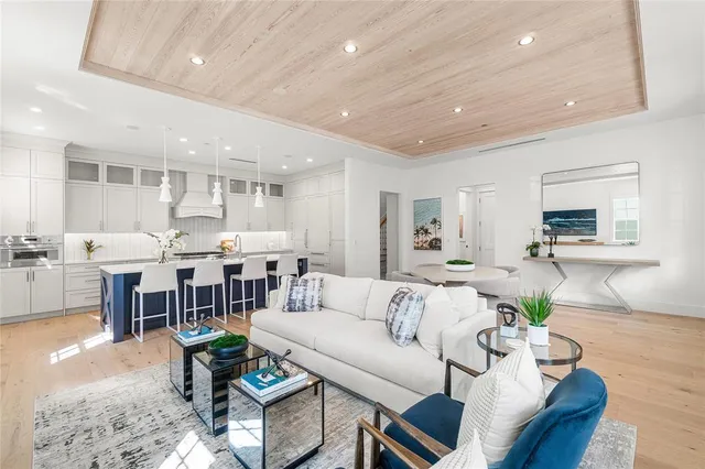 a kitchen with a sink cabinets and window