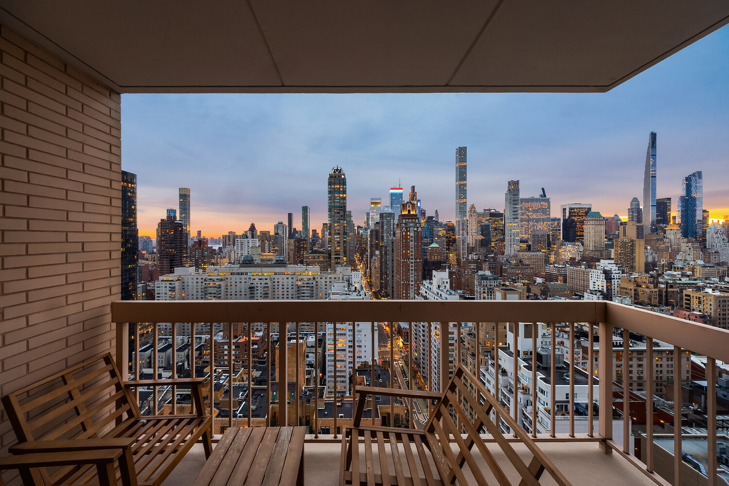 200 East 69th Street, Unit 31C Manhattan, NY 10021 - Photo 18 of 19 a view of a balcony with city view