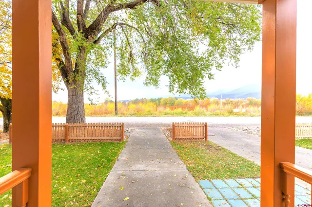 a view of a yard with an outdoor space