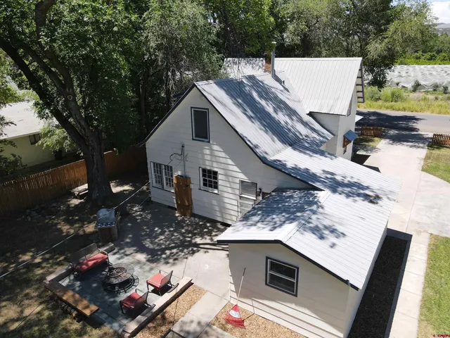 a view of a terrace with a tree