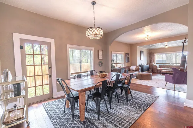 a view of a dining room with furniture