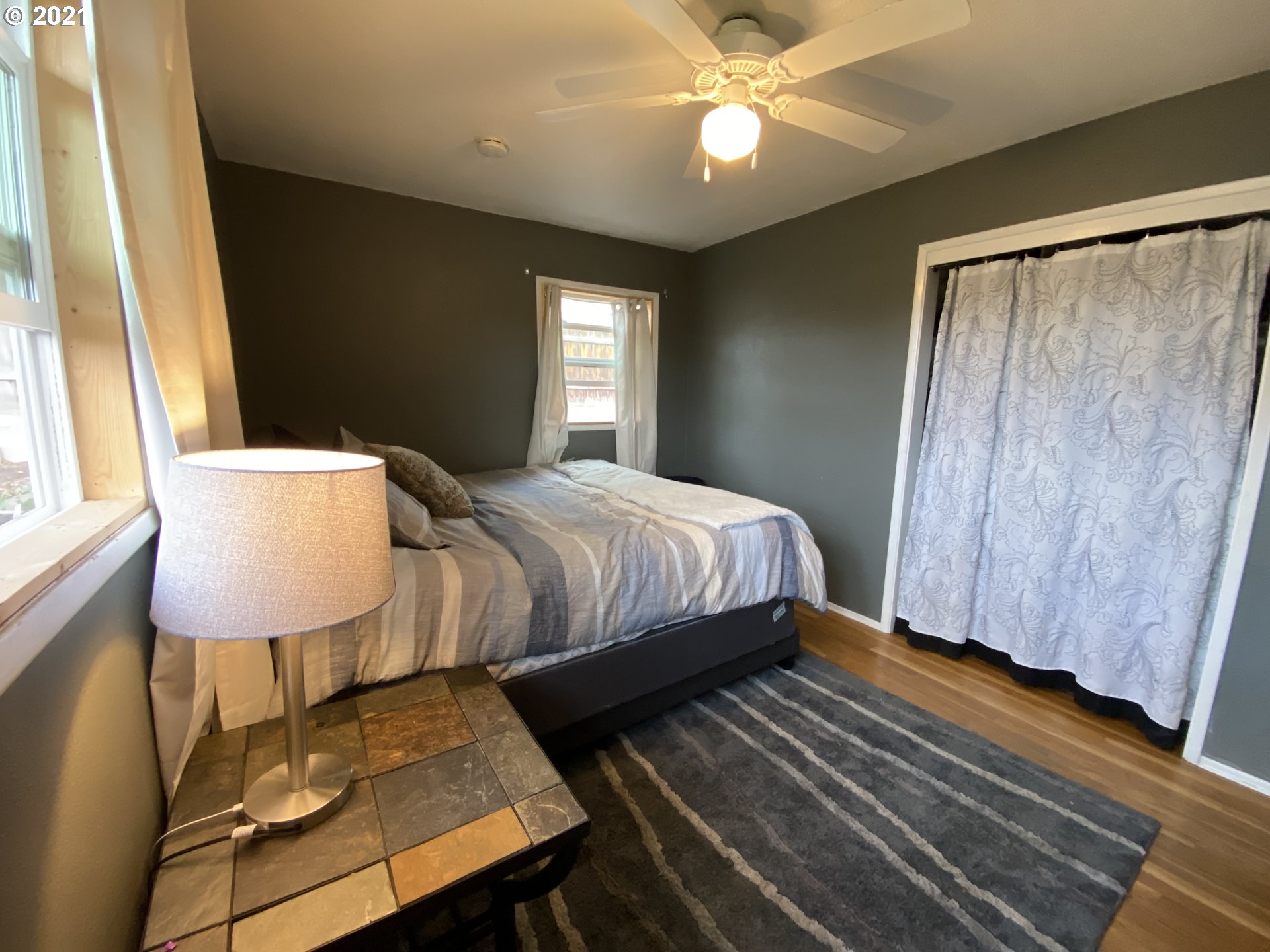 3216 Southwest Jay Avenue Pendleton, OR 97801 - Photo 22 of 32 a bedroom with a bed and a window