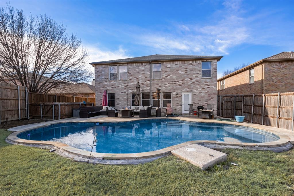 1609 Jester Court Little Elm, TX 75036 - Photo 33 of 34 a view of a house with swimming pool