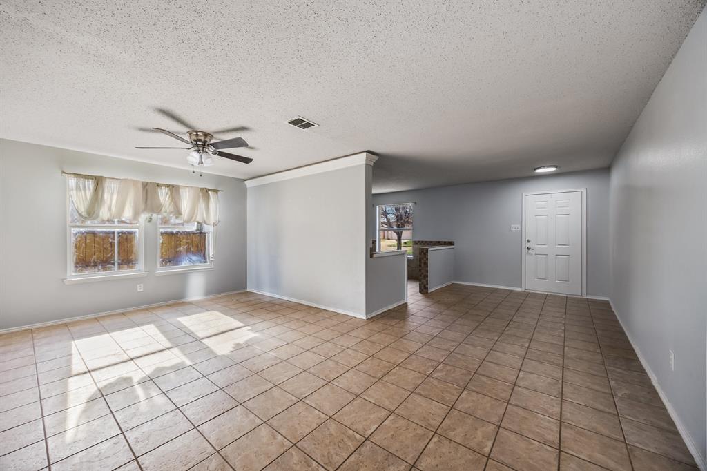 1609 Jester Court Little Elm, TX 75036 - Photo 6 of 34 a view of an empty room and window