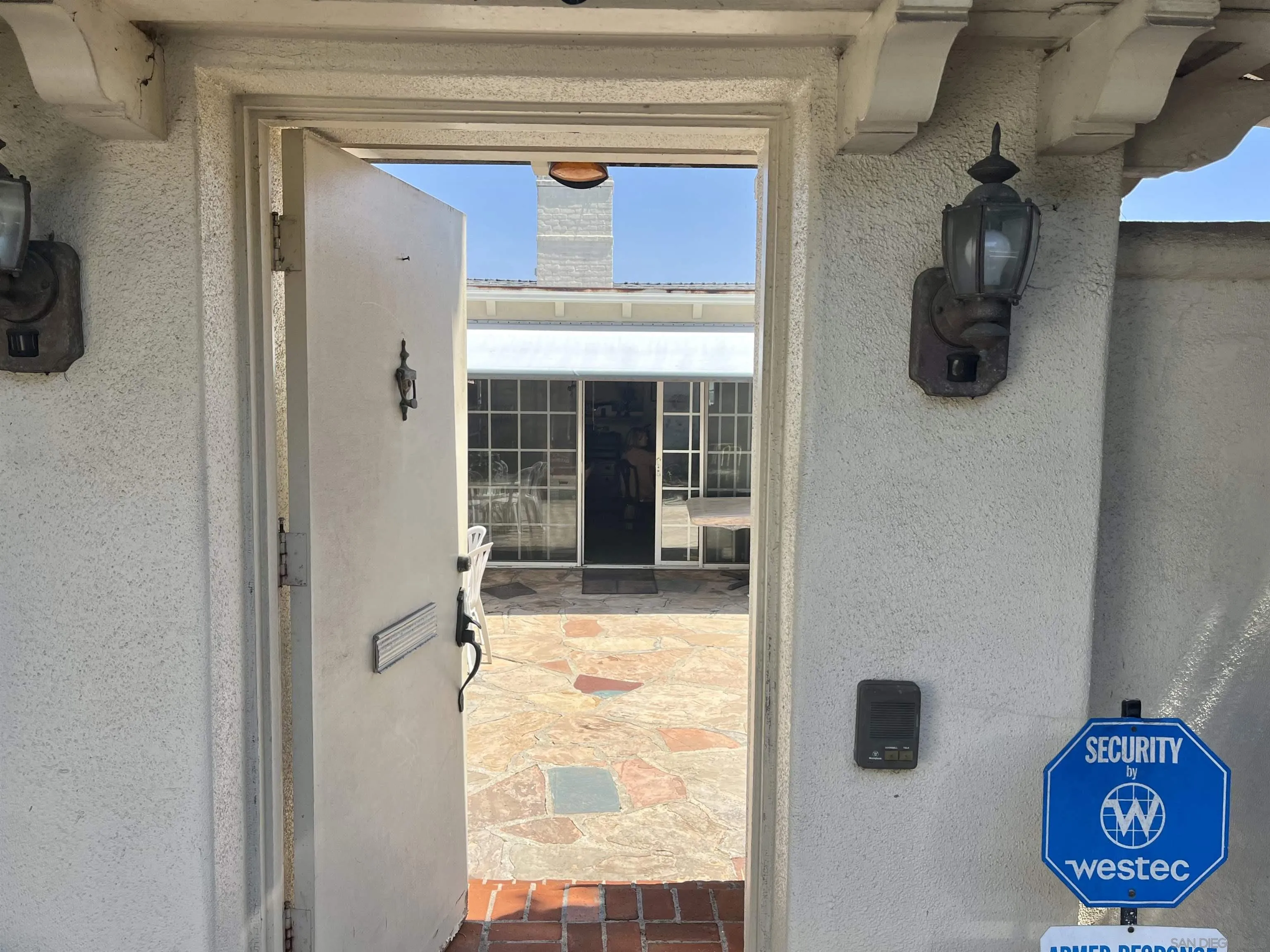 7976 Roseland Drive La Jolla, CA 92037 - Photo 3 of 7 a view of a entryway door of the house