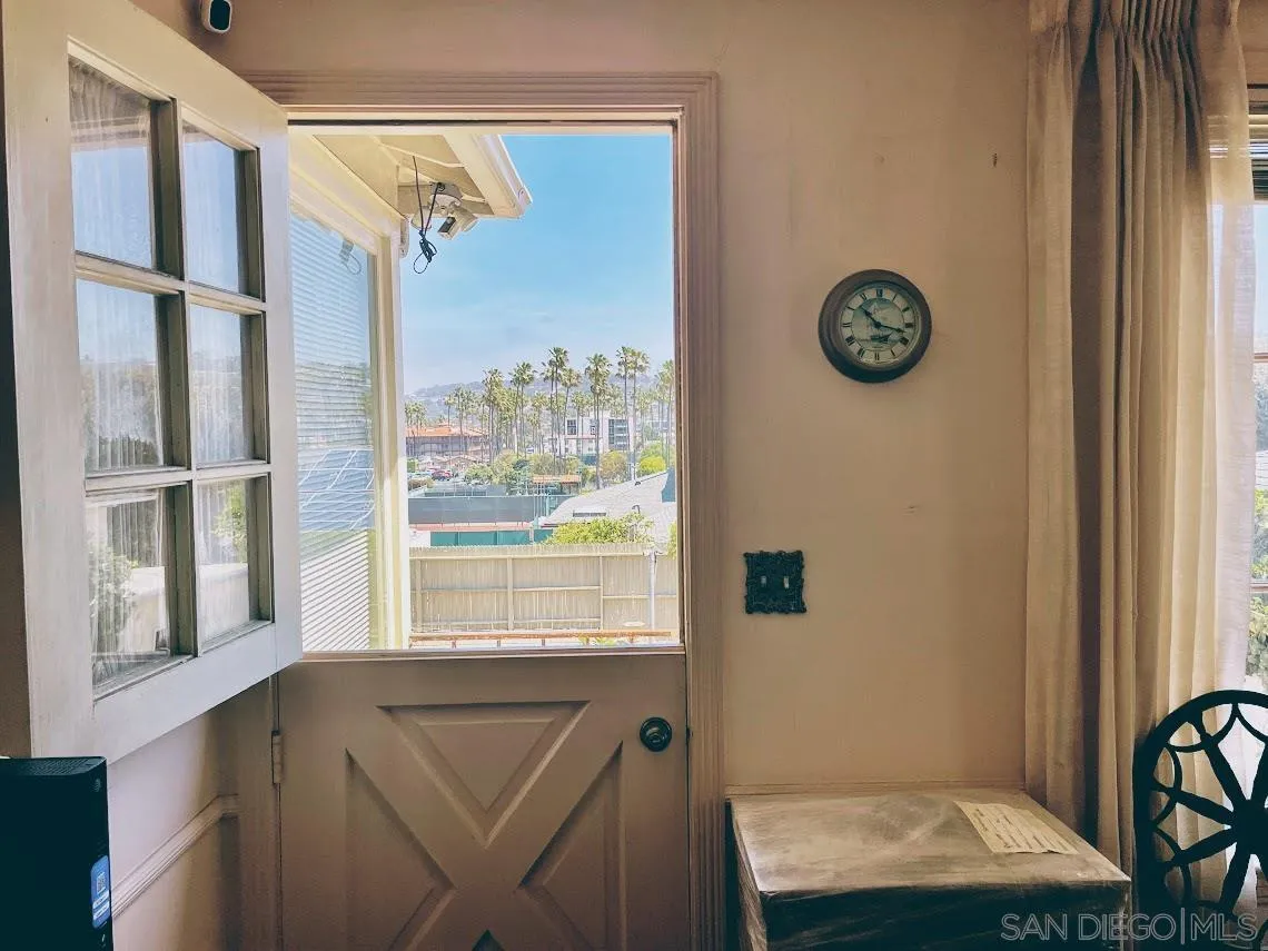 7976 Roseland Drive La Jolla, CA 92037 - Photo 7 of 7 a bathroom with a bathtub and a window