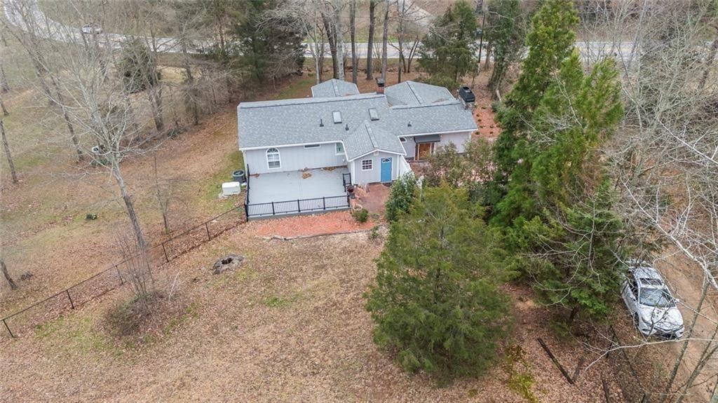 3819 Mason Creek Road Winston, GA 30187 - Photo 32 of 54 a view of a house with a yard and tree s