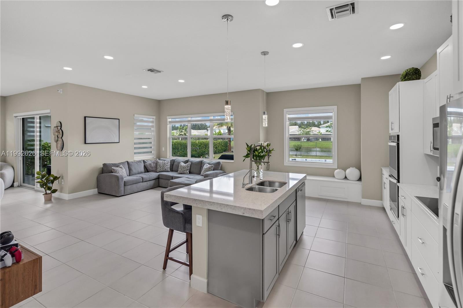 15769 Hummingbird Lane Loxahatchee, FL 33470 - Photo 15 of 54 a very nice looking room with a large window