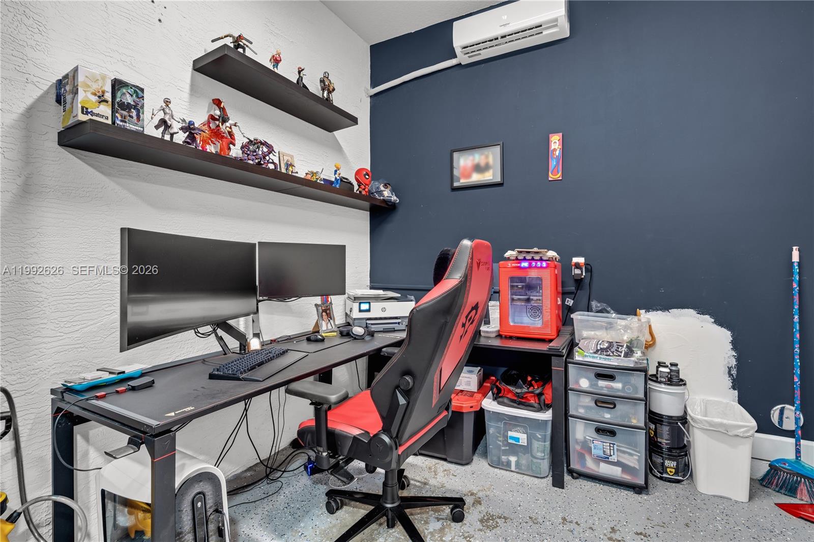 15769 Hummingbird Lane Loxahatchee, FL 33470 - Photo 37 of 54 a room with furniture and wooden floor