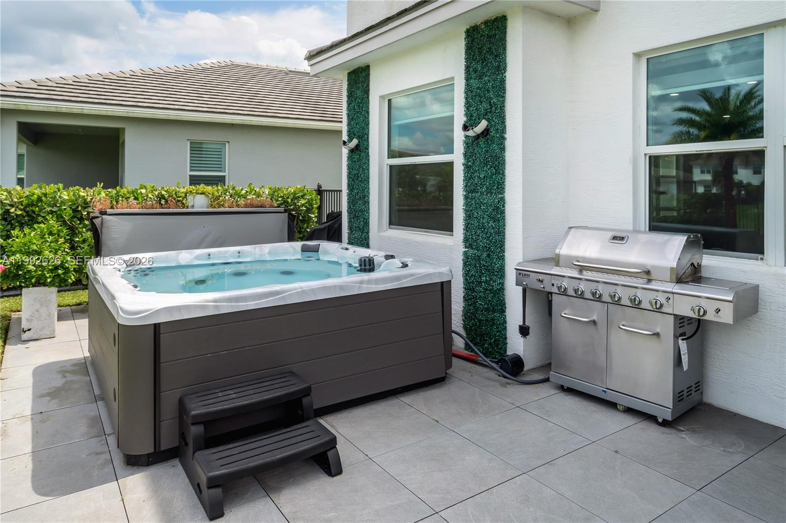 15769 Hummingbird Lane Loxahatchee, FL 33470 - Photo 40 of 54 a room with storage and utility