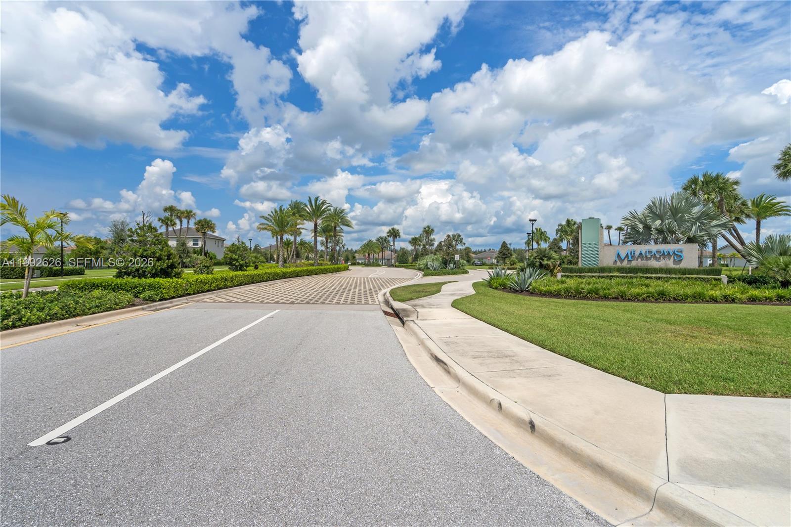 15769 Hummingbird Lane Loxahatchee, FL 33470 - Photo 45 of 54 a view of a street with a big yard