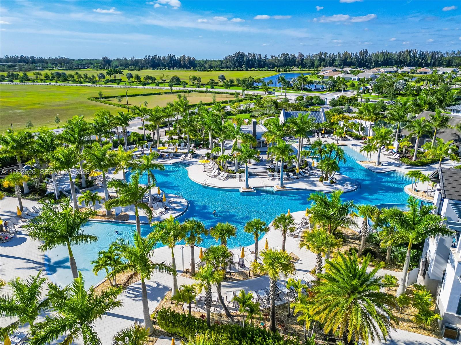 15769 Hummingbird Lane Loxahatchee, FL 33470 - Photo 51 of 54 a view of a city with lots of trees