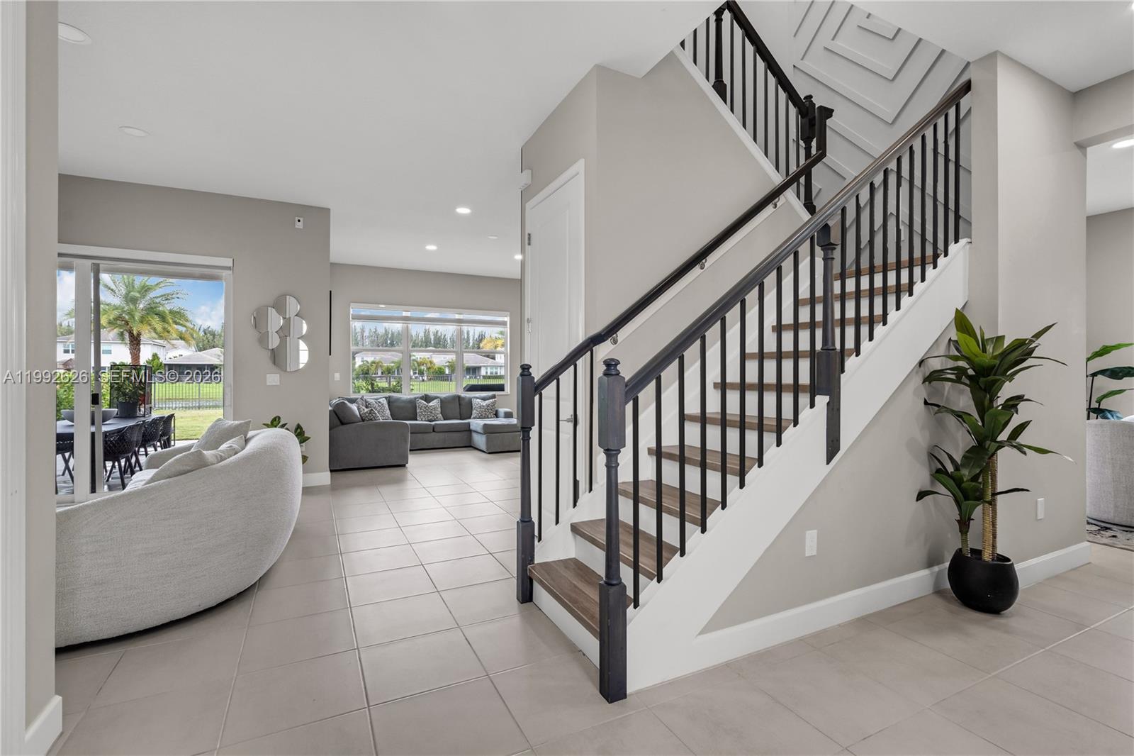 15769 Hummingbird Lane Loxahatchee, FL 33470 - Photo 6 of 54 a view of entryway and livingroom