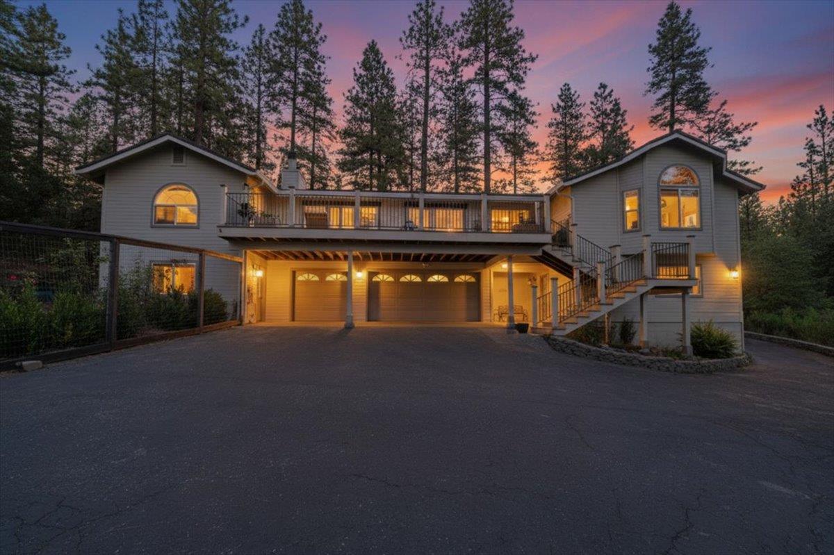 14271 Falling Star Lane Grass Valley, CA 95949 - Photo 1 of 1 a front view of a house with a yard