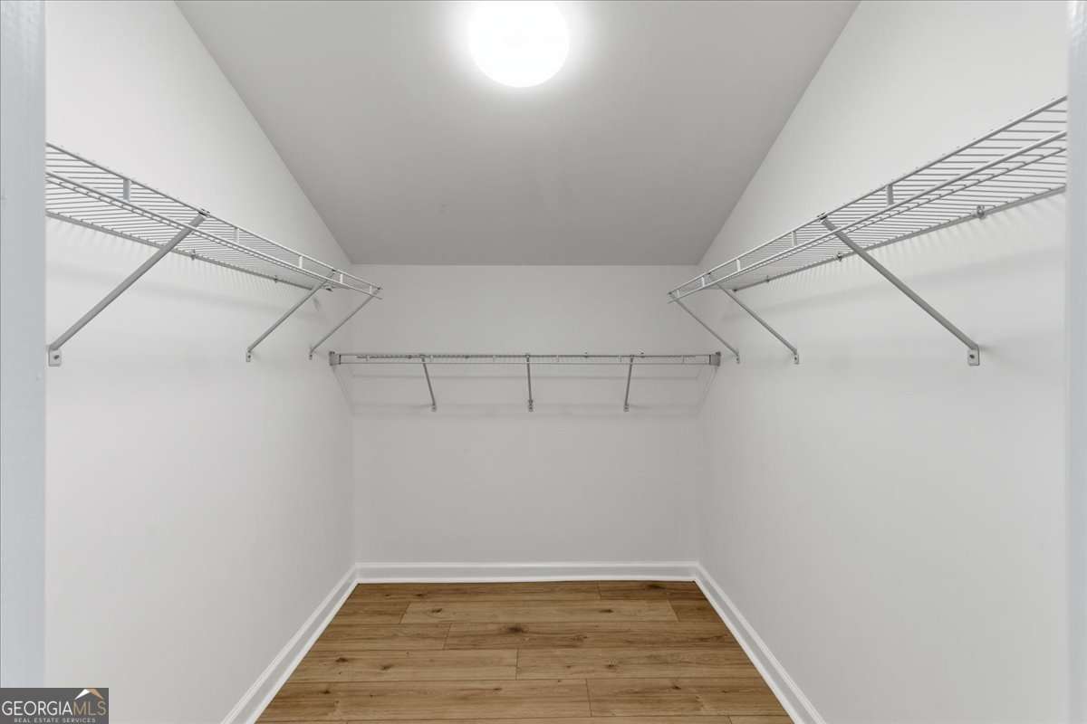 119 Jackson Street Northeast Rome, GA 30161 - Photo 32 of 57 a view of a room with racks on the wall