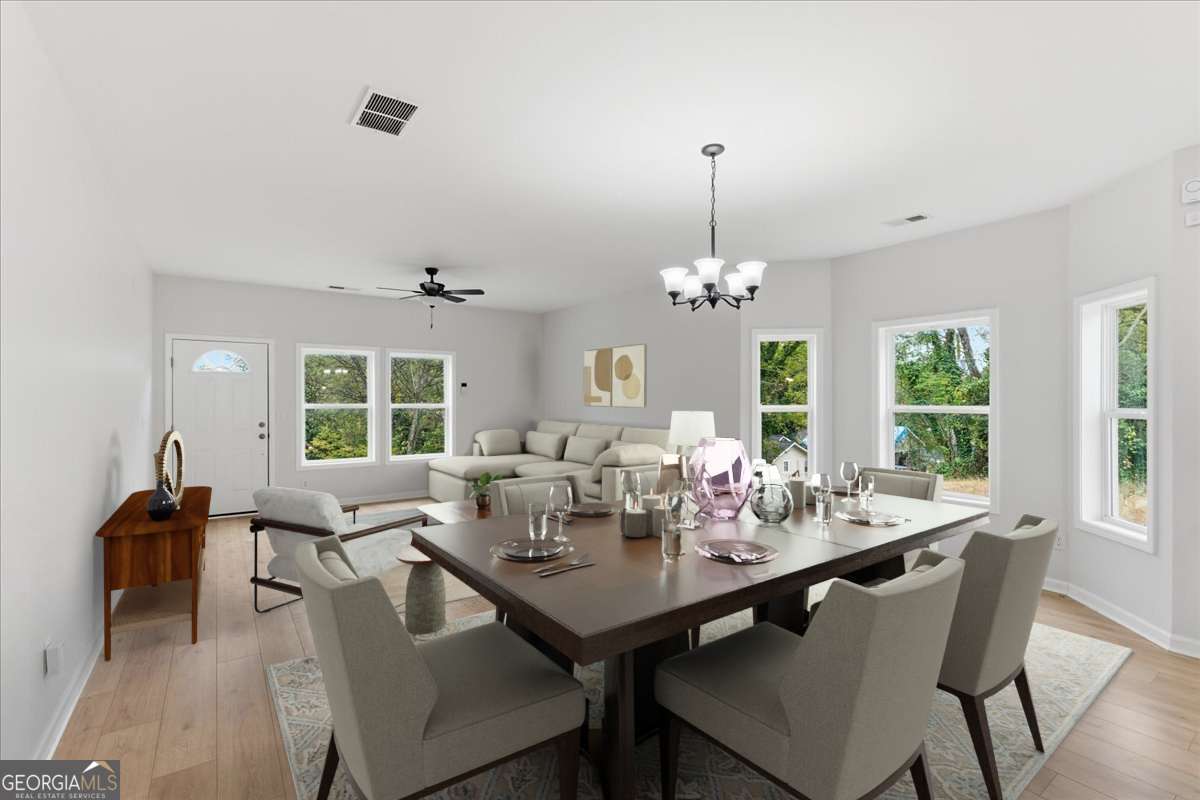 119 Jackson Street Northeast Rome, GA 30161 - Photo 4 of 57 a view of a dining room with furniture window and outside view