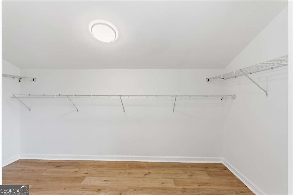 119 Jackson Street Northeast Rome, GA 30161 - Photo 44 of 57 a view of a room with racks on the wall