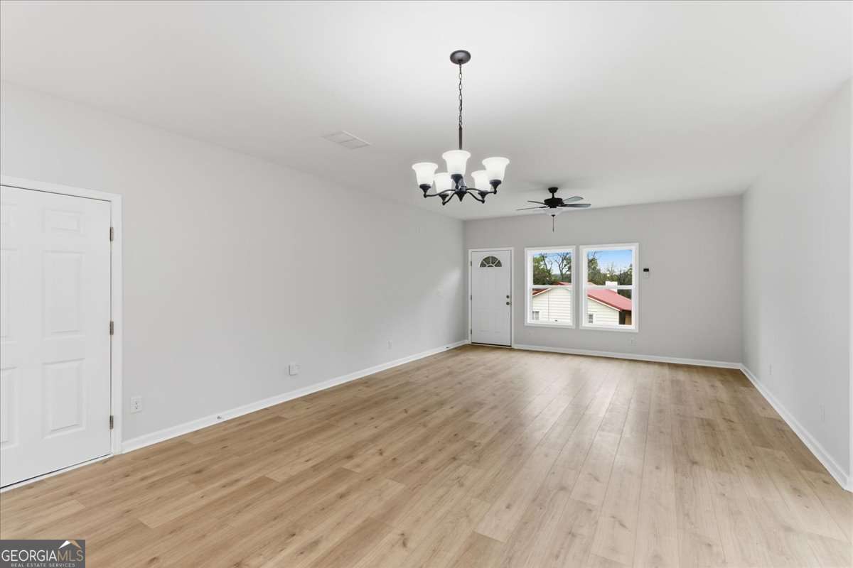 119 Jackson Street Northeast Rome, GA 30161 - Photo 9 of 57 a view of livingroom with window