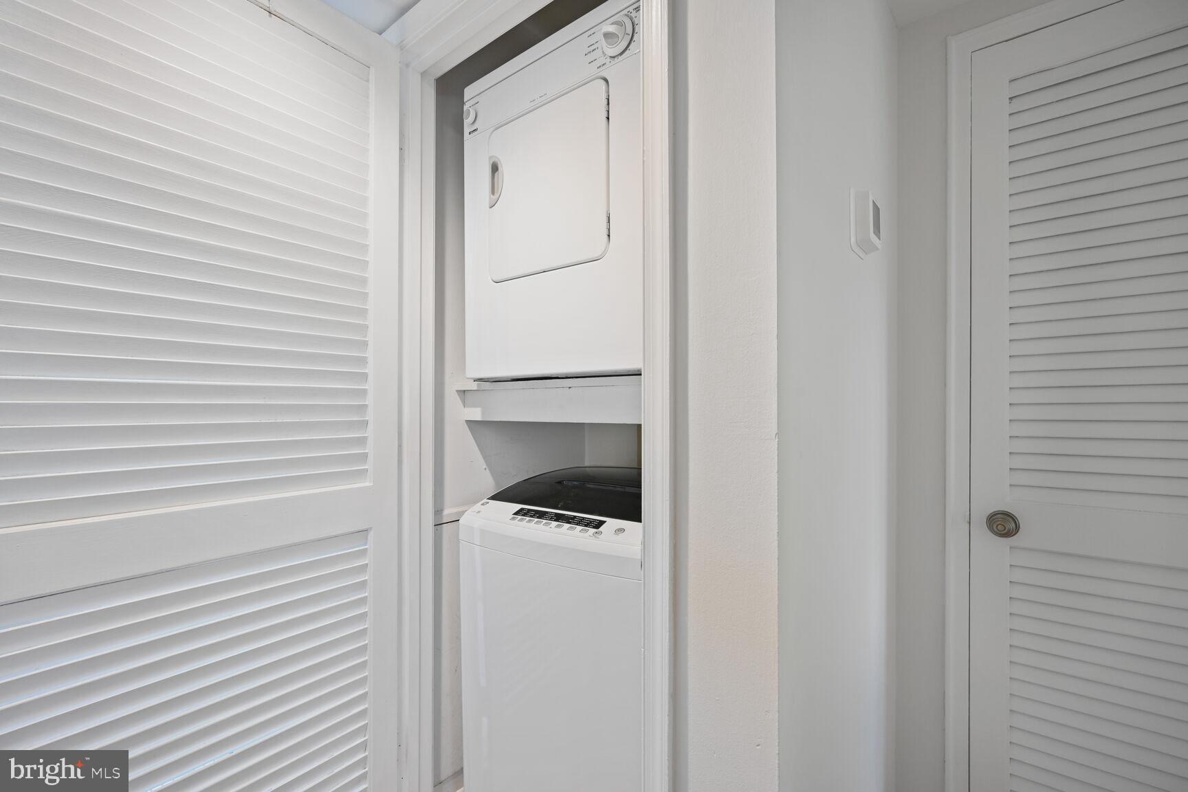 2242 Washington Avenue, Unit W303 Silver Spring, MD 20910 - Photo 14 of 37 a bathroom with a toilet