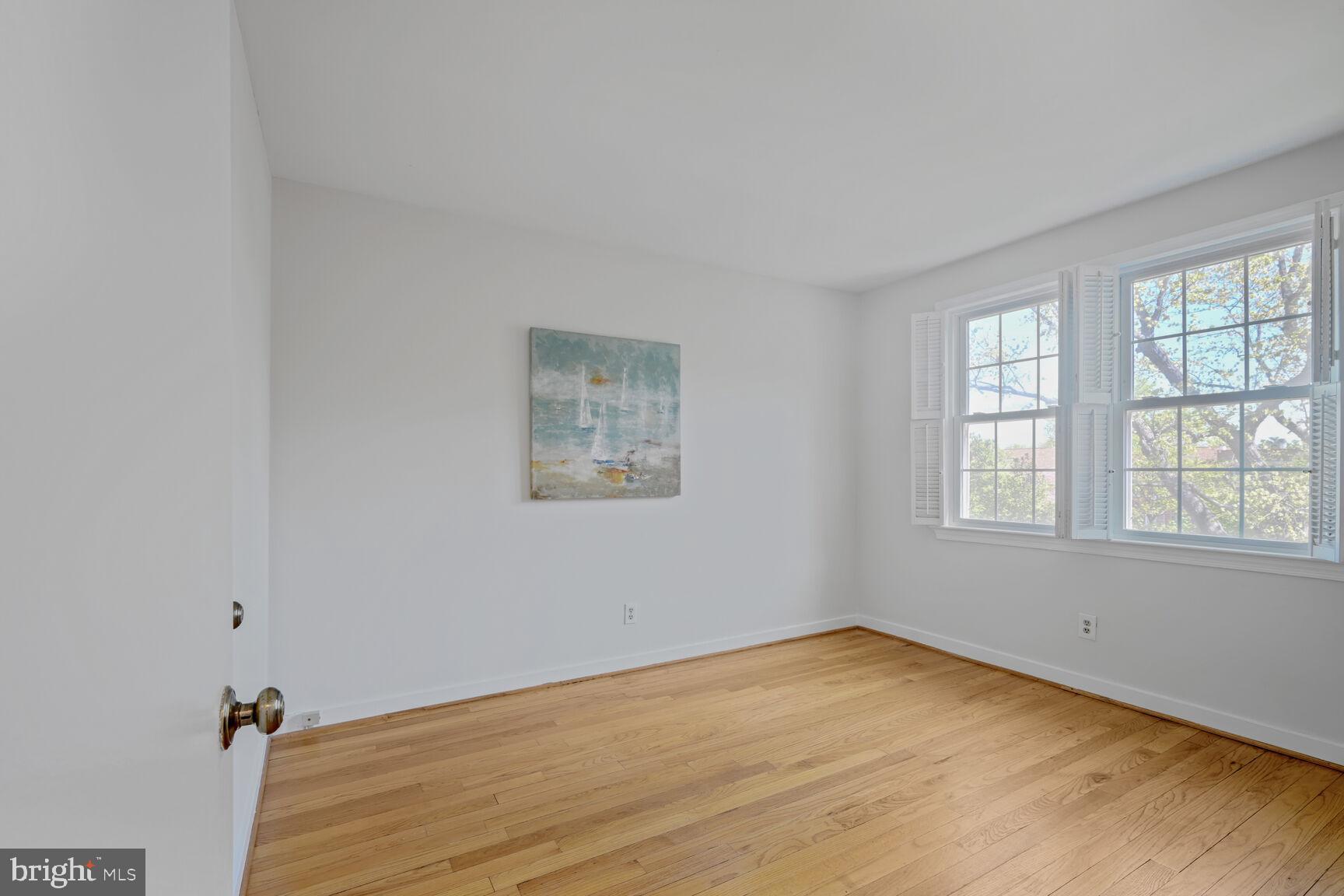 2242 Washington Avenue, Unit W303 Silver Spring, MD 20910 - Photo 17 of 37 an empty room with a window