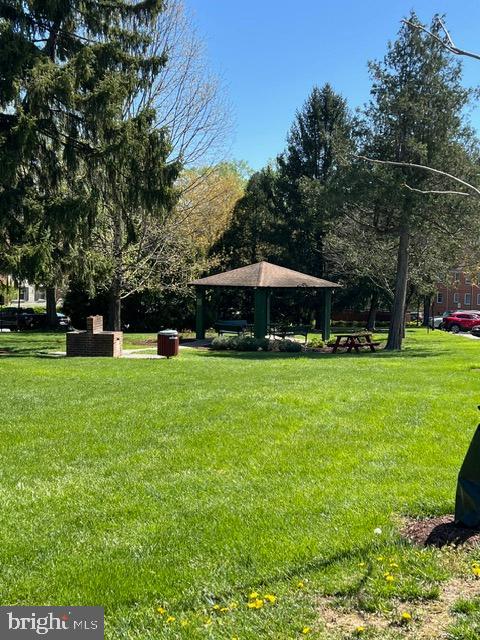 2242 Washington Avenue, Unit W303 Silver Spring, MD 20910 - Photo 24 of 37 a view of outdoor space with deck and yard