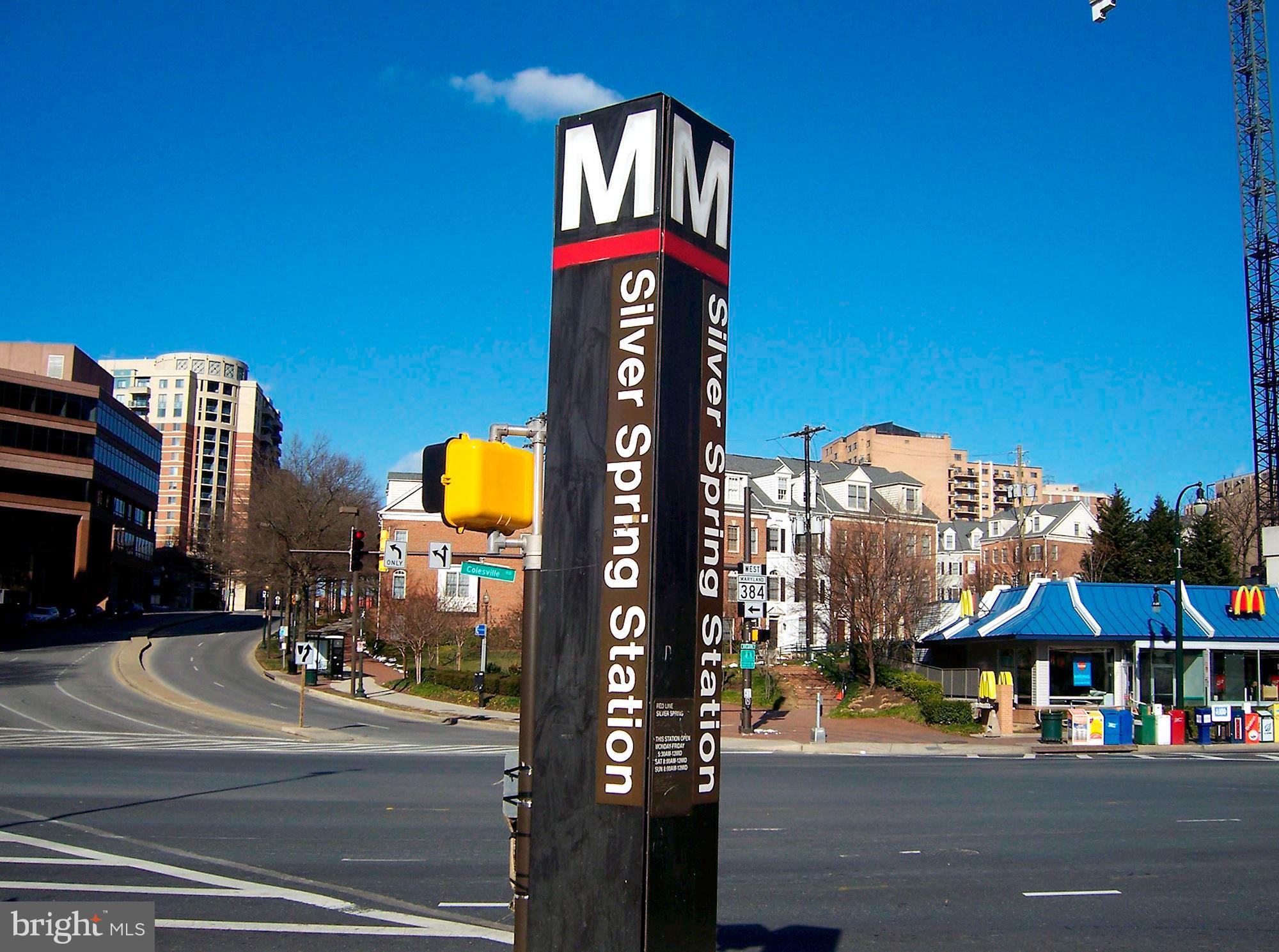 2242 Washington Avenue, Unit W303 Silver Spring, MD 20910 - Photo 25 of 37 a street view with tall buildings and a street view