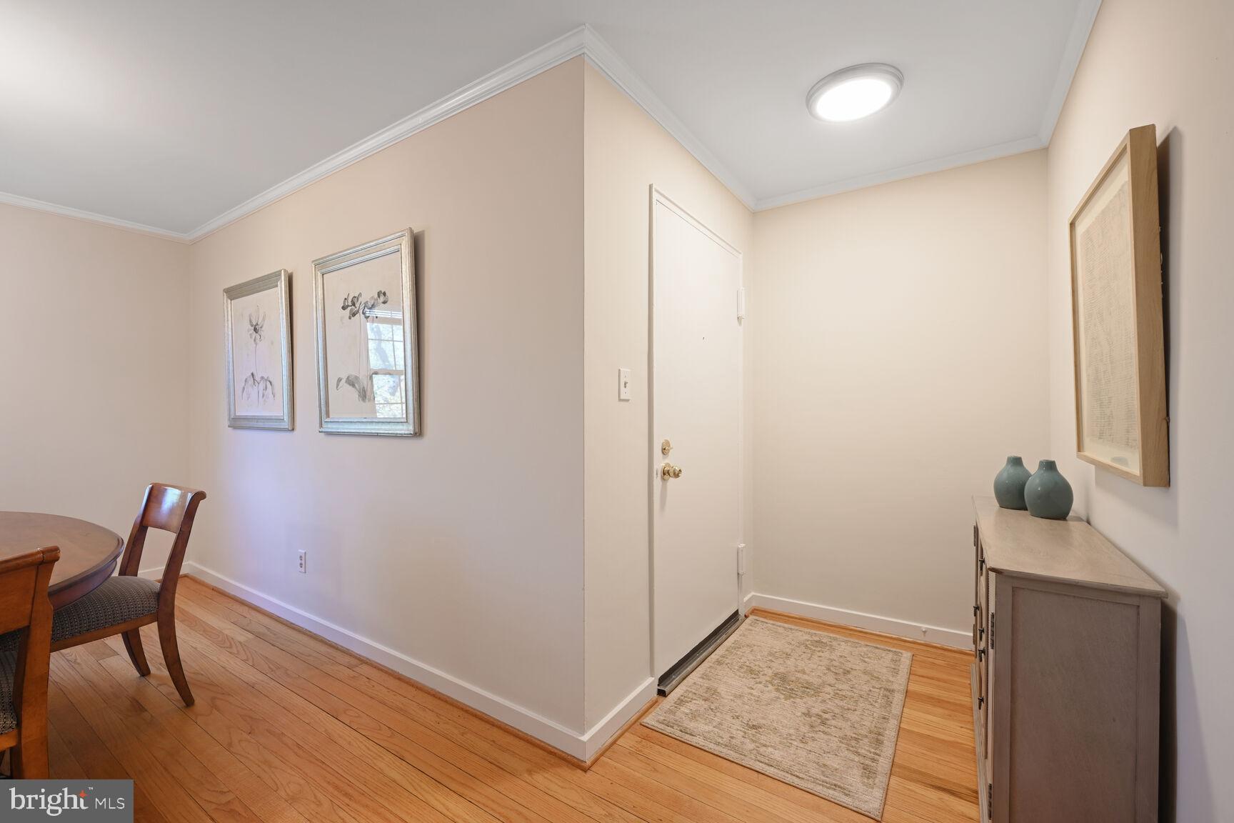 2242 Washington Avenue, Unit W303 Silver Spring, MD 20910 - Photo 3 of 37 a view of room with window and wooden floor