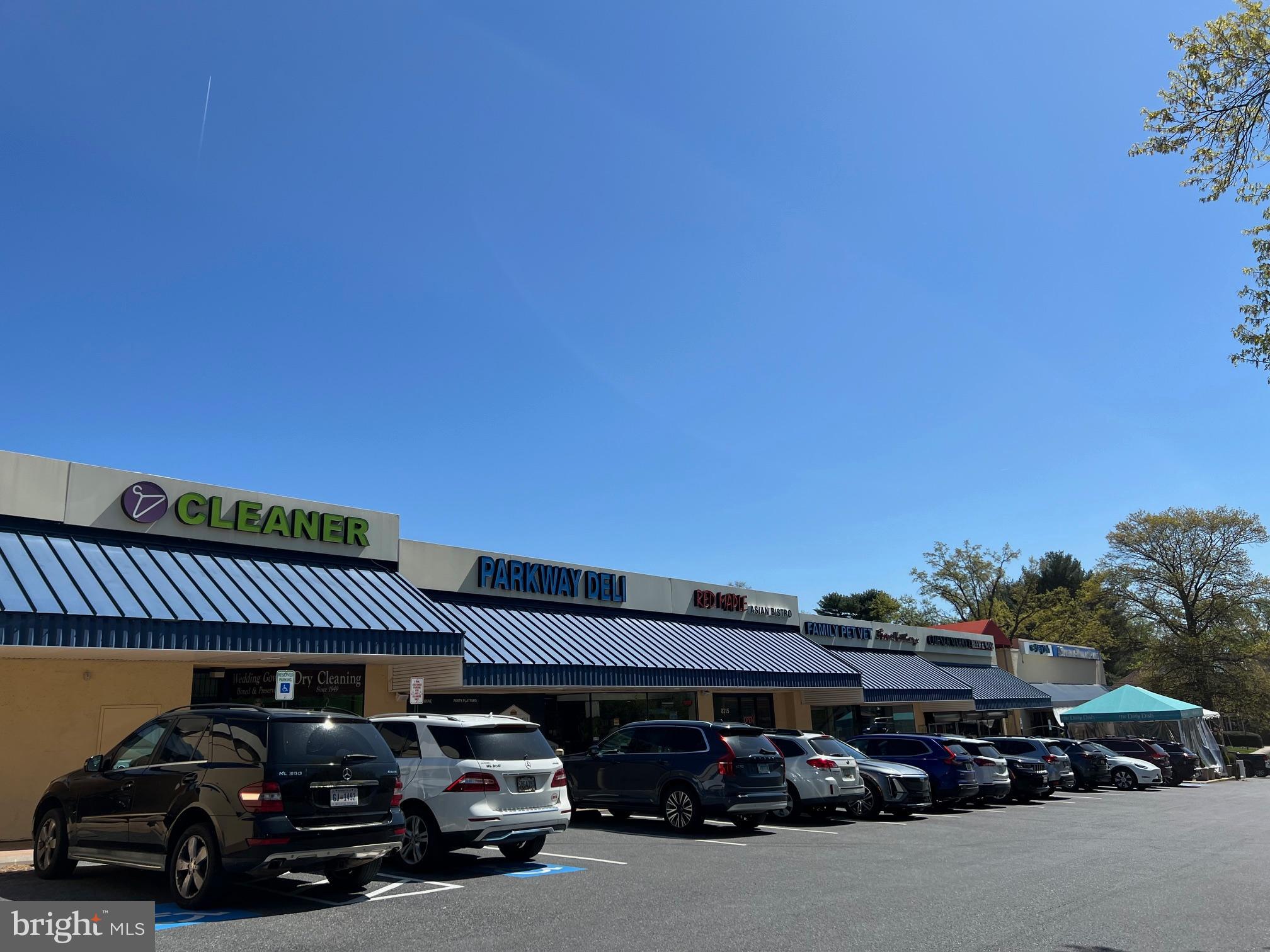 2242 Washington Avenue, Unit W303 Silver Spring, MD 20910 - Photo 34 of 37 a car parked in front of a building