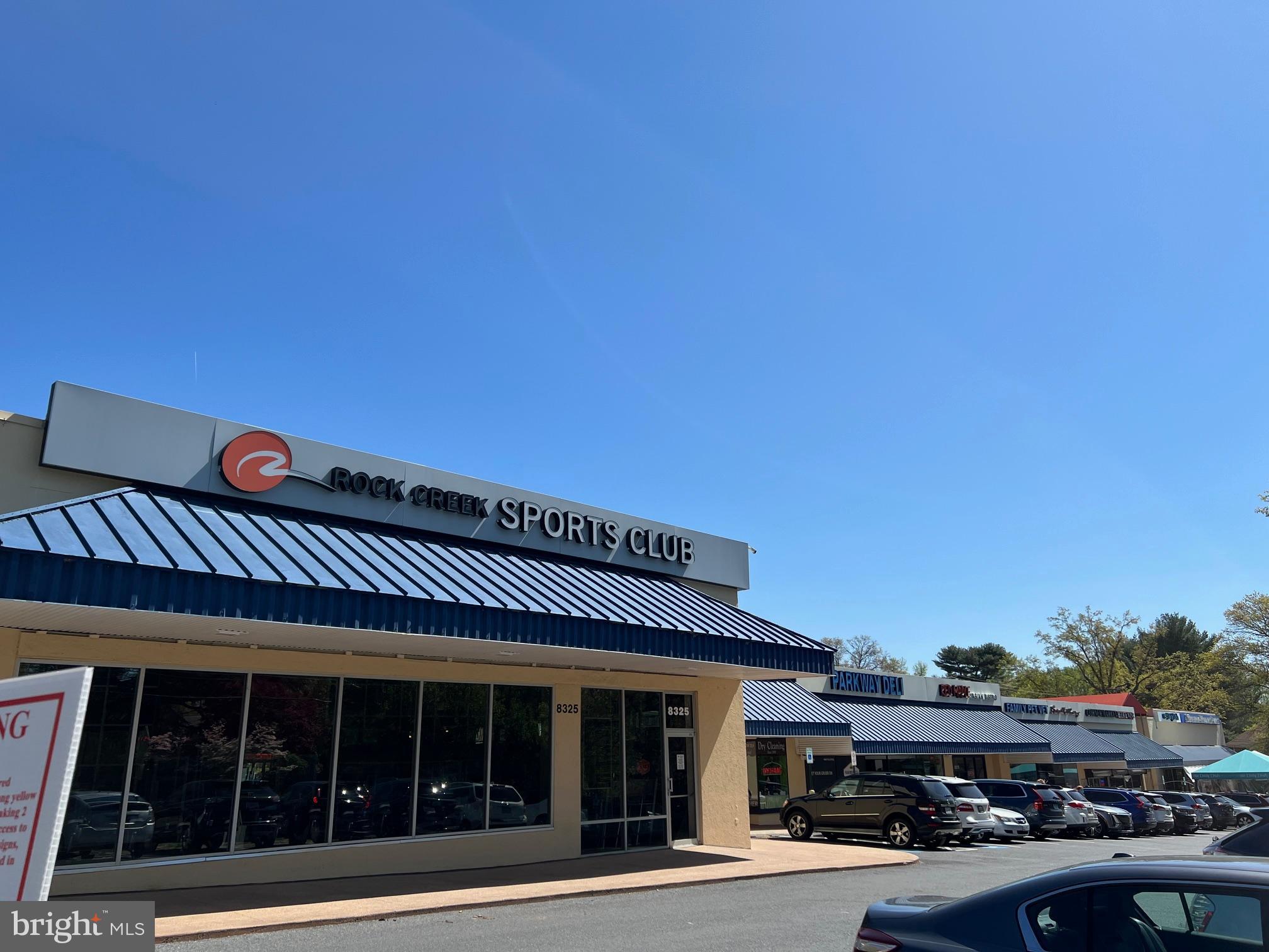 2242 Washington Avenue, Unit W303 Silver Spring, MD 20910 - Photo 36 of 37 a front view of a building with glass windows