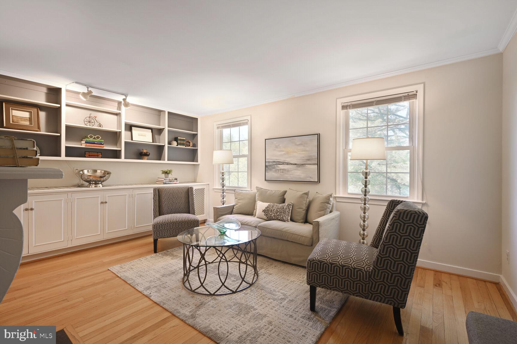 2242 Washington Avenue, Unit W303 Silver Spring, MD 20910 - Photo 5 of 37 a living room with furniture and a window