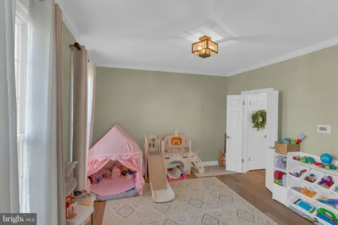 a bedroom with a bed and a cabinets